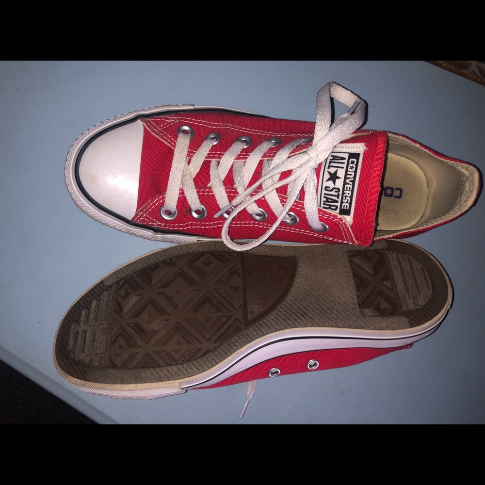 Red chuck taylor converse.